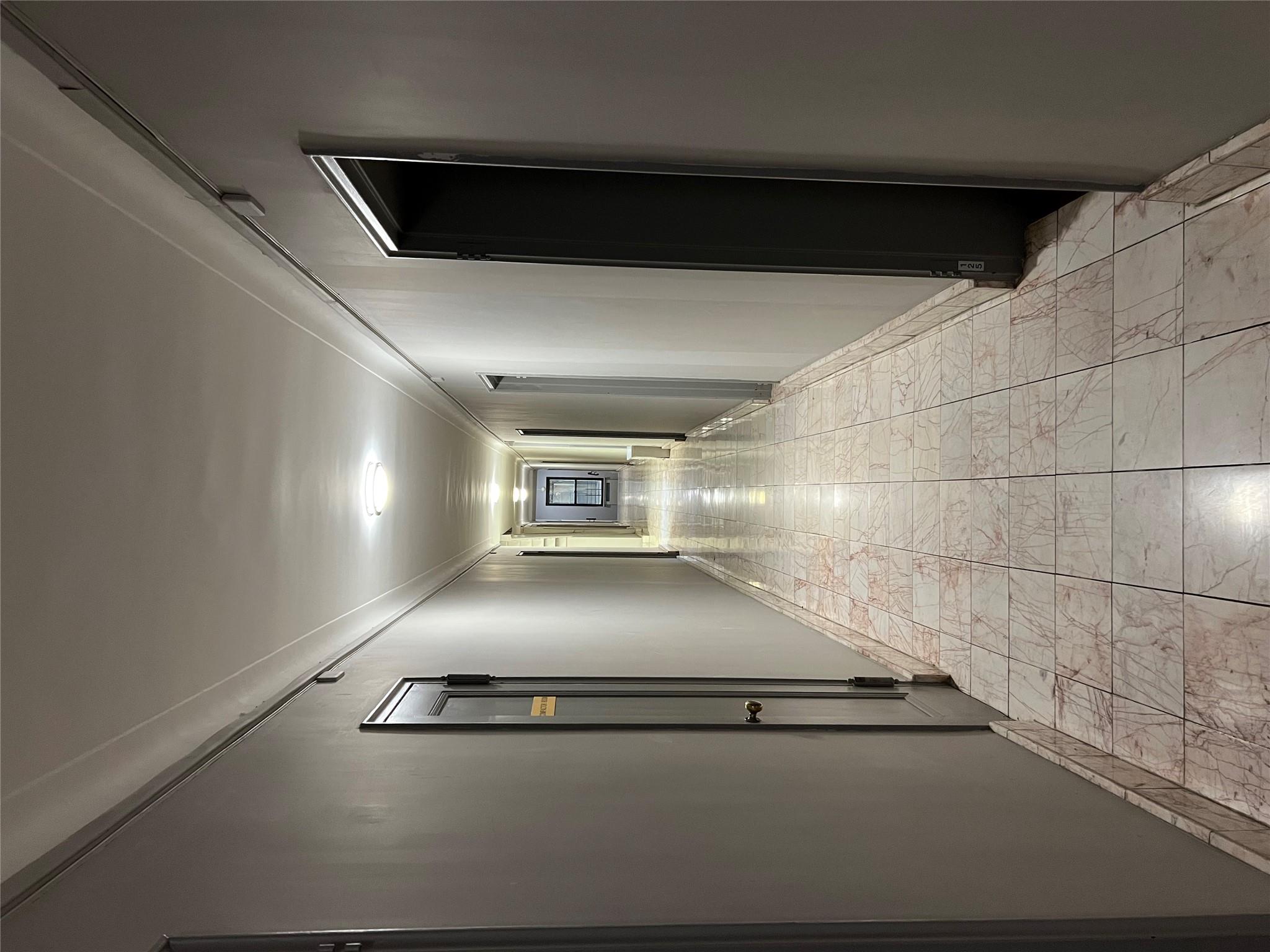 35-35 75th Street, Unit 127 Queens, NY 11372 - Photo 36 of 50 Hallway featuring crown molding