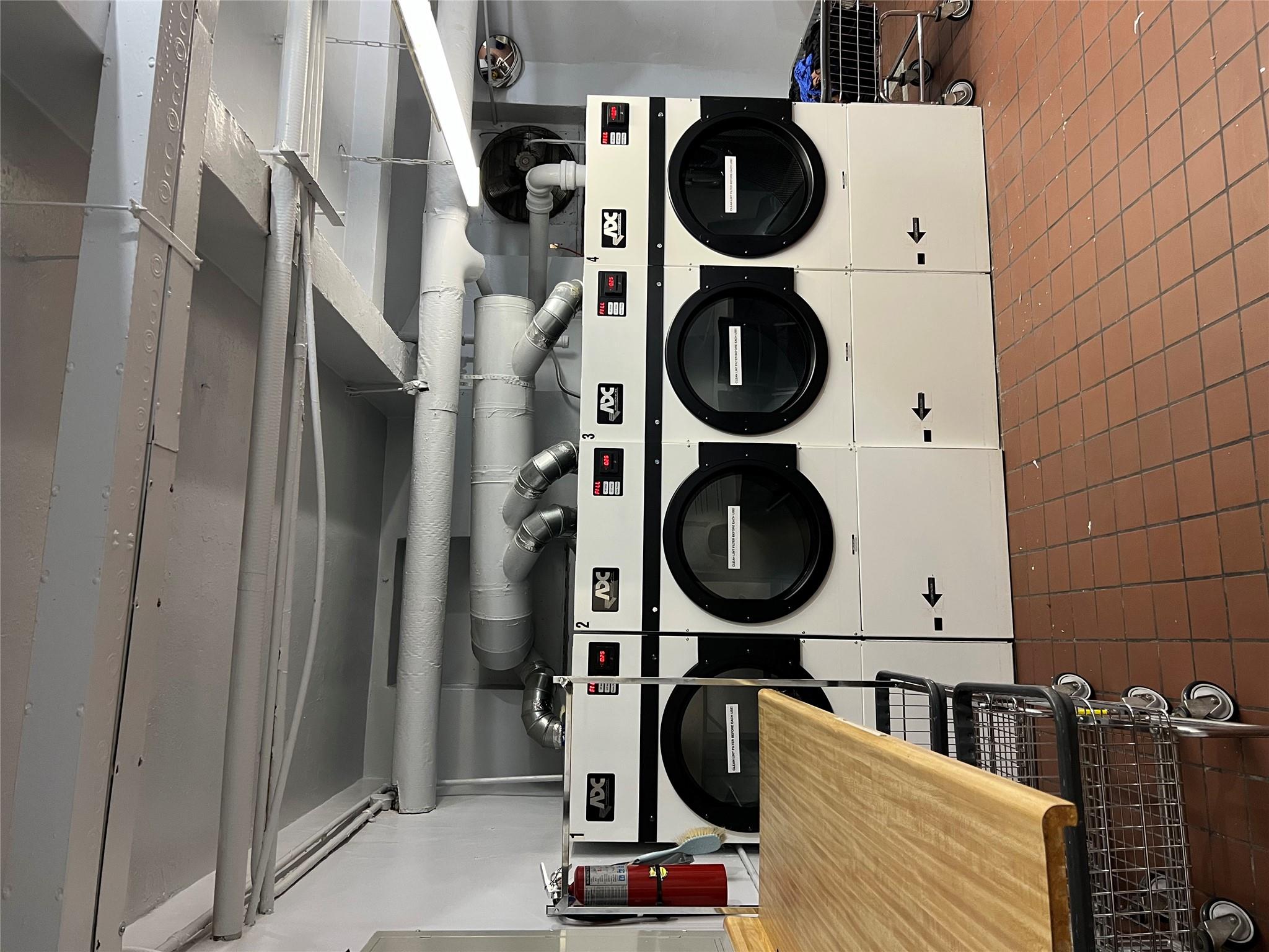 35-35 75th Street, Unit 127 Queens, NY 11372 - Photo 42 of 50 Washroom with washer and dryer