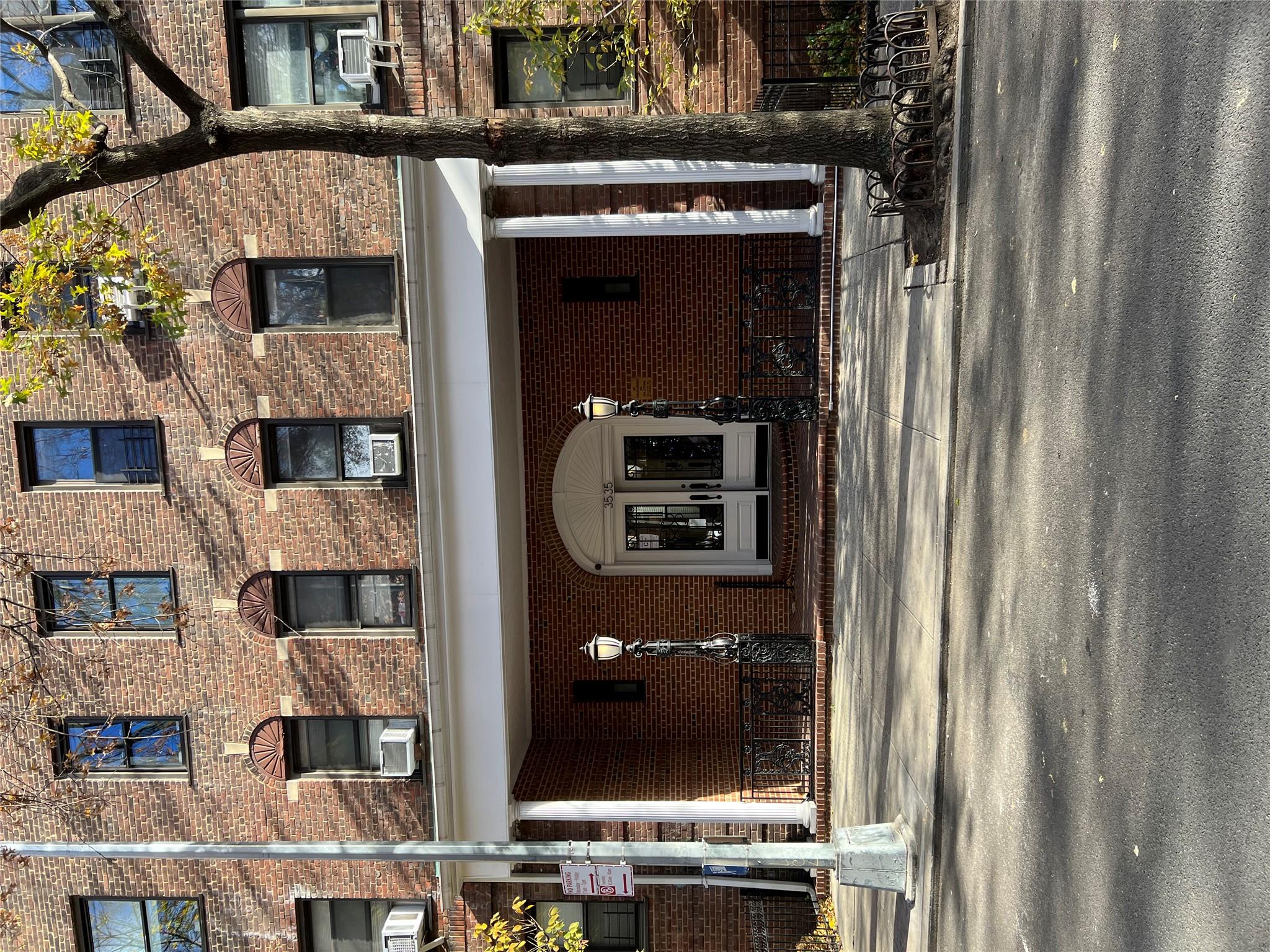 35-35 75th Street, Unit 127 Queens, NY 11372 - Photo 7 of 50 View of building exterior featuring cooling unit