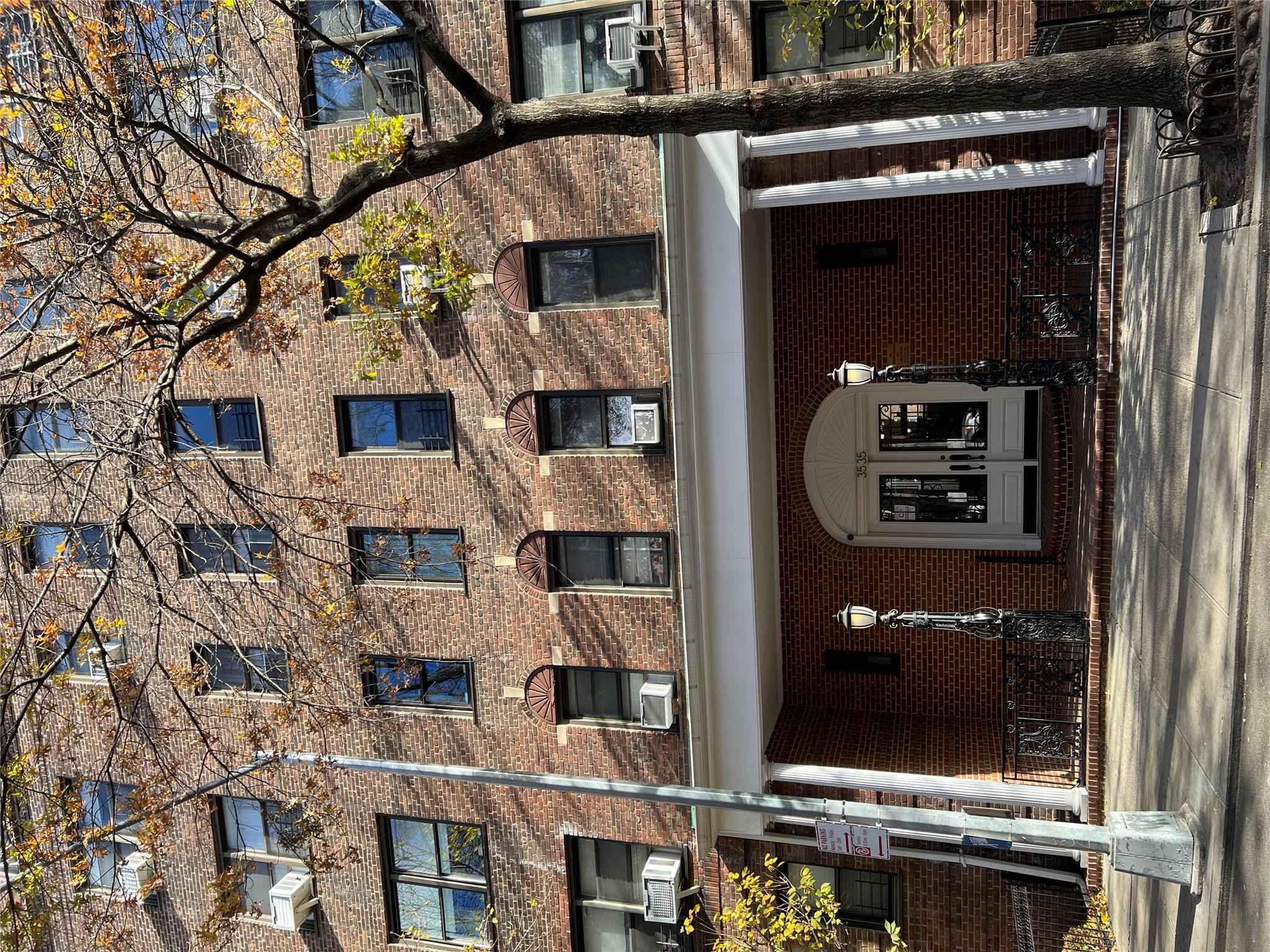 35-35 75th Street, Unit 127 Queens, NY 11372 - Photo 8 of 50 View of building exterior with cooling unit