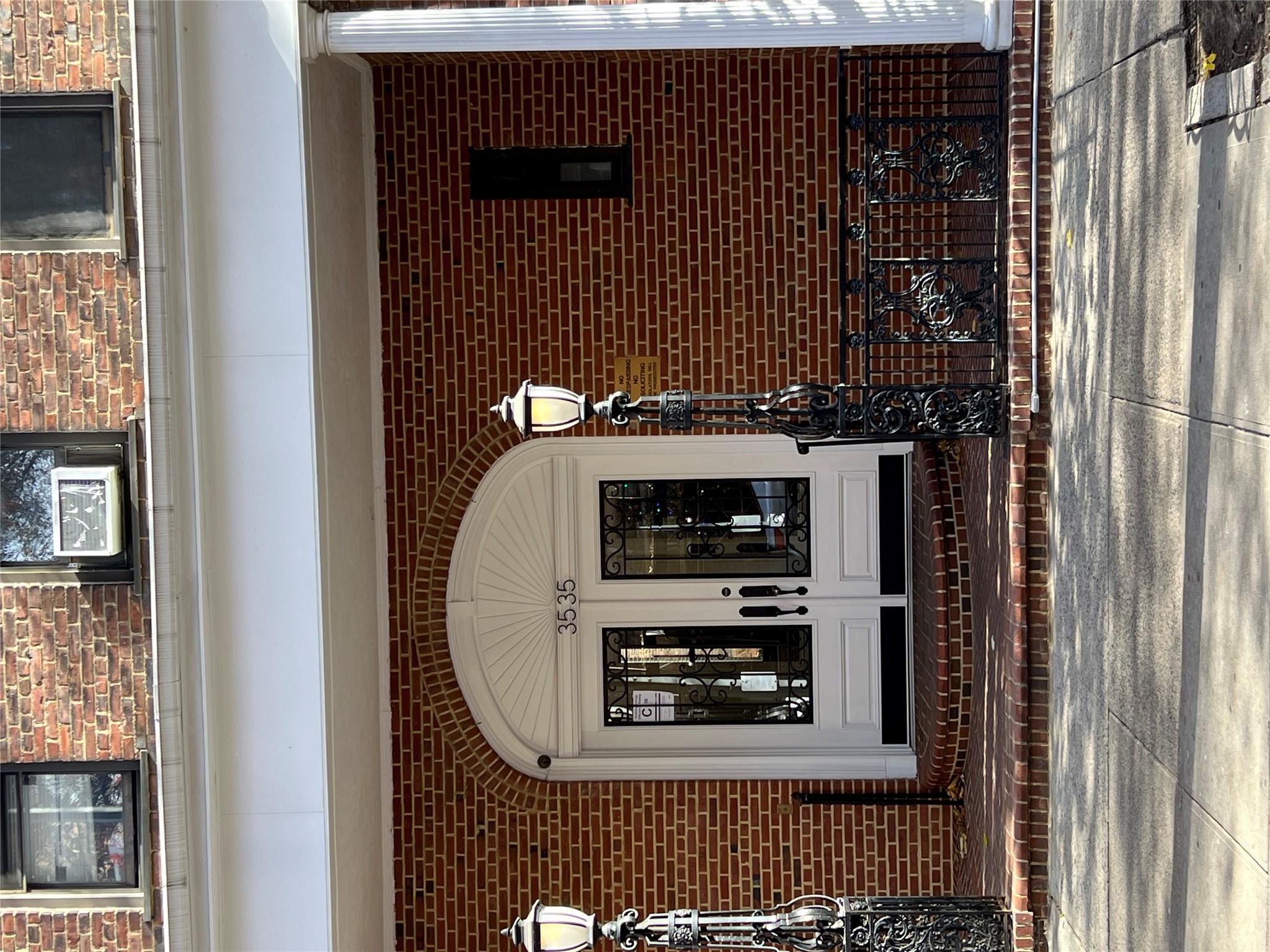 35-35 75th Street, Unit 127 Queens, NY 11372 - Photo 9 of 50 View of exterior entry featuring french doors