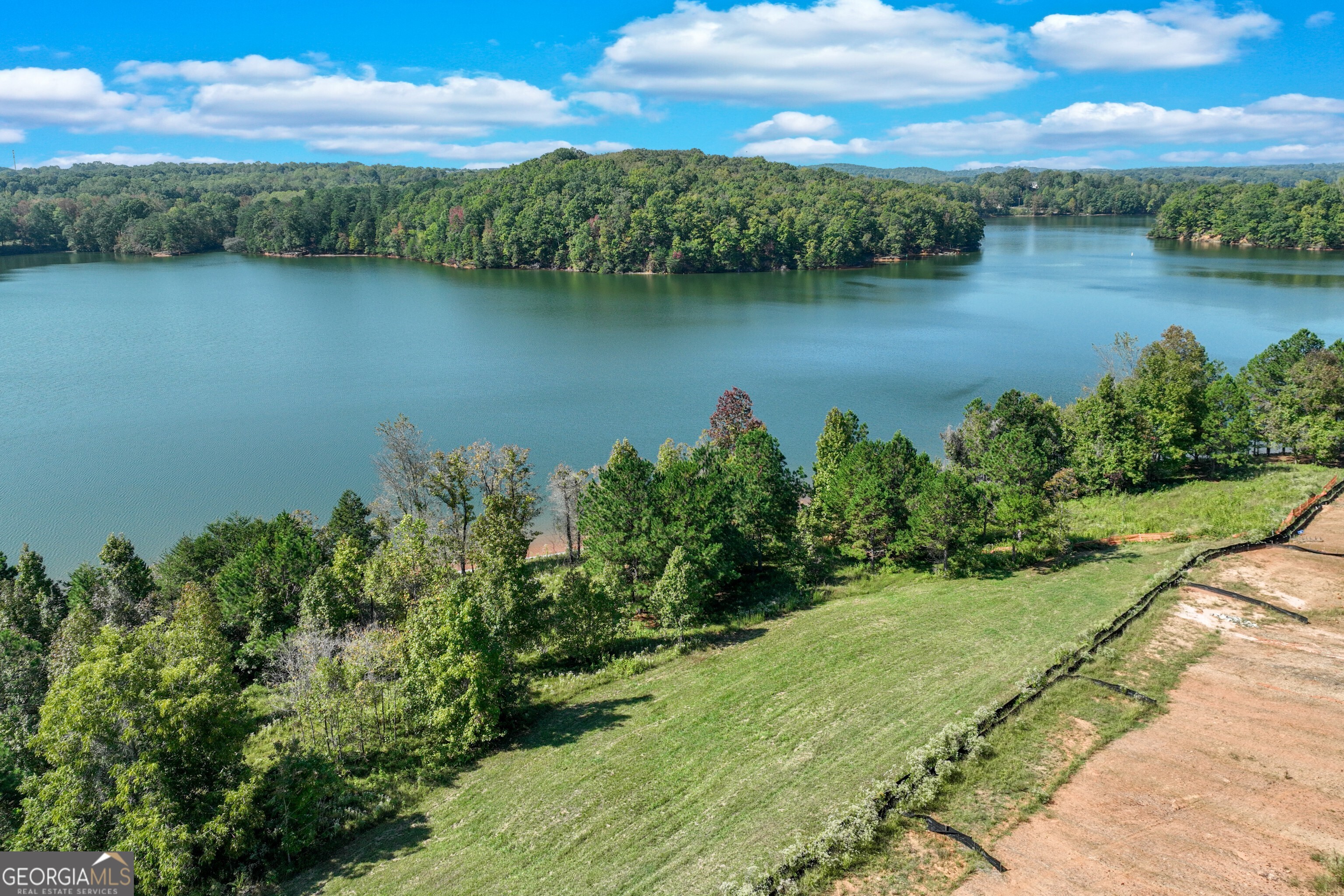 4540 Shirley Road, Unit LOT 15 Gainesville, GA 30506 - Photo 5 of 22 an aerial view of a houses with lake view