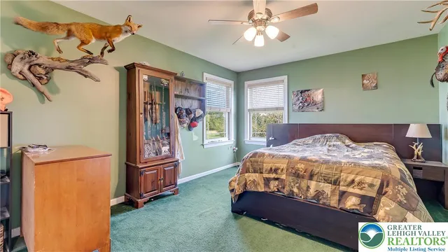 a view of a golf course with a lake