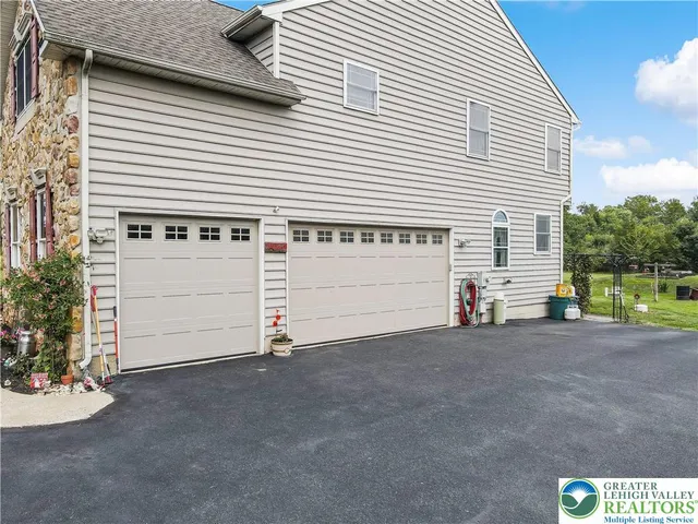 a view of a house with a garage