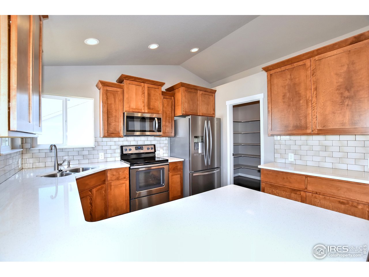 637 Rock Road Eaton, CO 80615 - Photo 10 of 32 Lovely quartz counters
