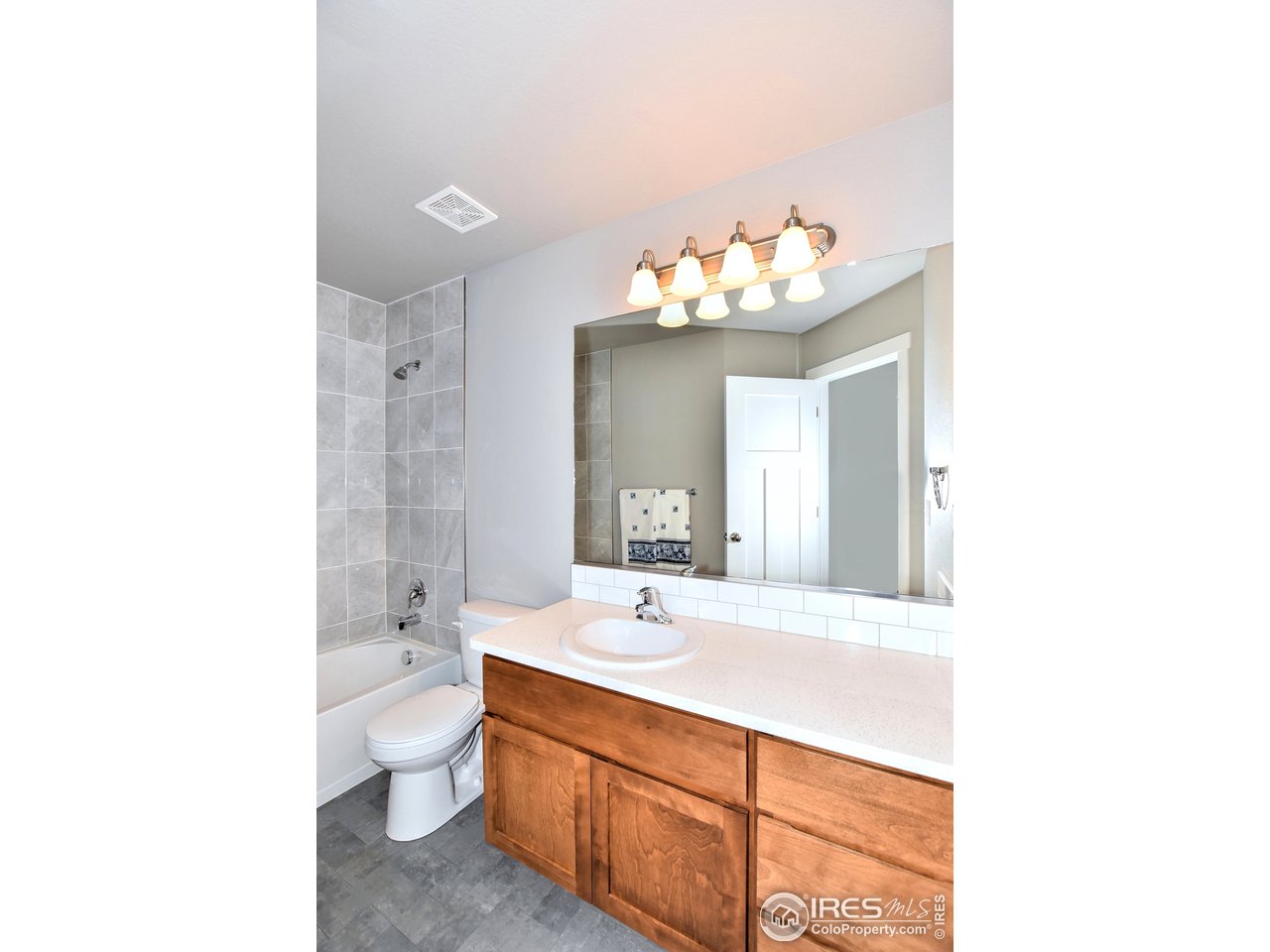 637 Rock Road Eaton, CO 80615 - Photo 24 of 32 Full bathroom on main level
