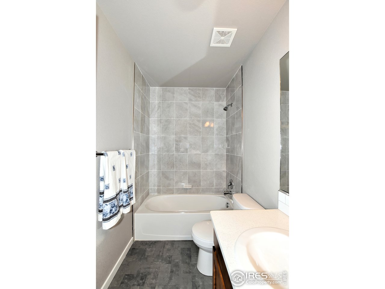 637 Rock Road Eaton, CO 80615 - Photo 25 of 32 Beautiful tile in shower/tub area