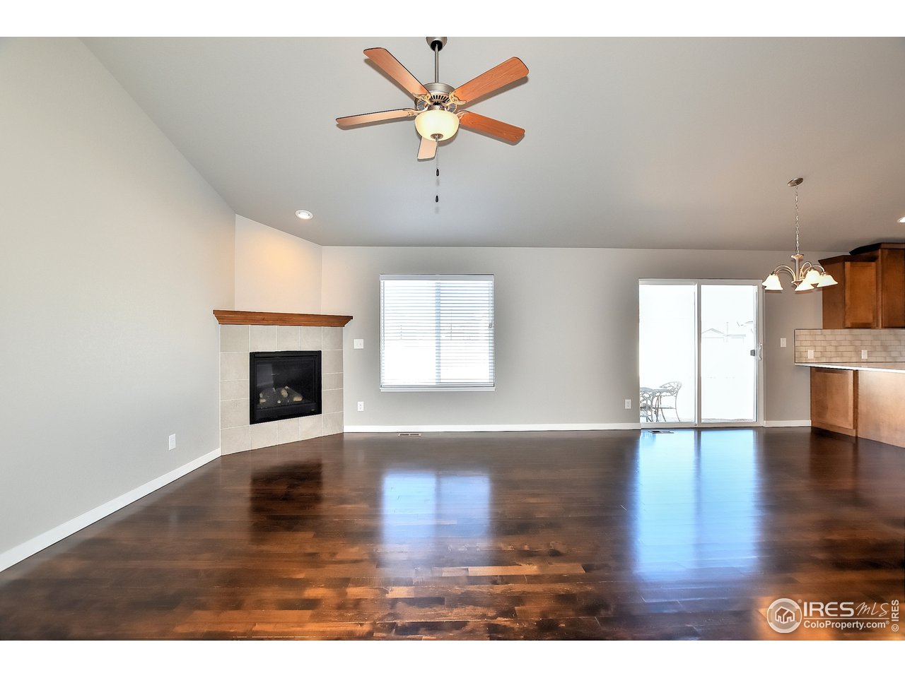 637 Rock Road Eaton, CO 80615 - Photo 5 of 32 Vaulted ceilings and beautiful fireplace