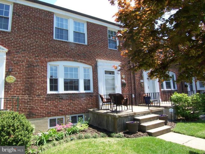 331 Stratford Road Catonsville, MD 21228 - Photo 1 of 30 a front view of a house with patio