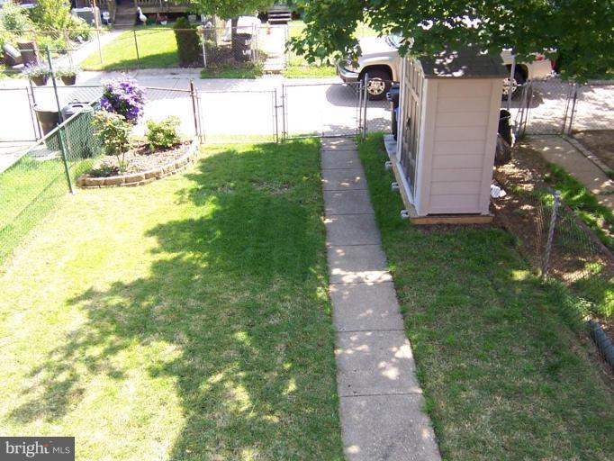 331 Stratford Road Catonsville, MD 21228 - Photo 6 of 30 a view of a back yard of the house