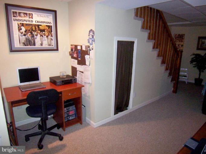331 Stratford Road Catonsville, MD 21228 - Photo 9 of 30 a view of a workspace with furniture and closet
