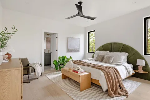 a bathroom with a sink a mirror and a toilet