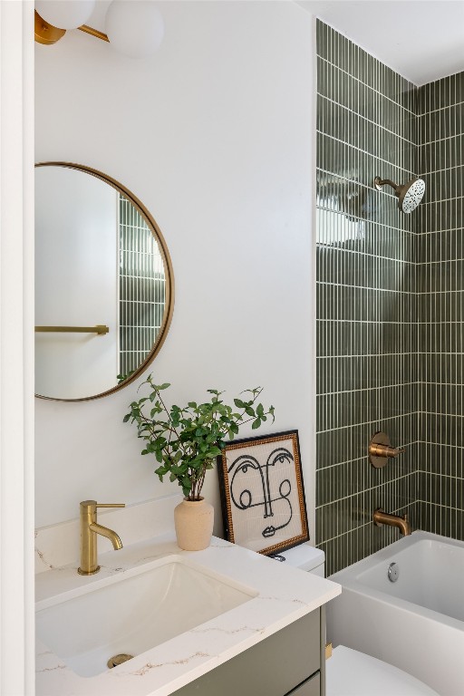 505 Philco Drive, Unit 3 Austin, TX 78745 - Photo 24 of 36 a bathroom with a sink a mirror and a shower