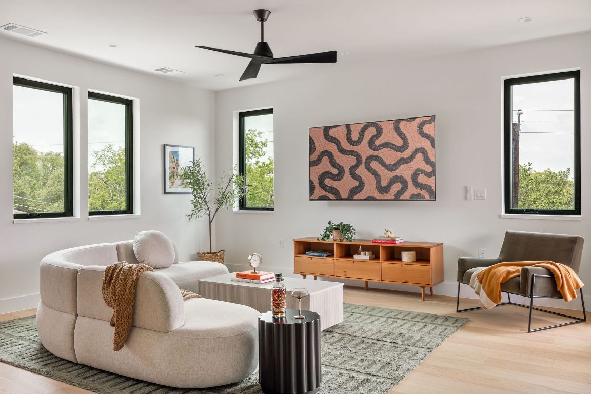 505 Philco Drive, Unit 3 Austin, TX 78745 - Photo 26 of 36 a living room with furniture and a window