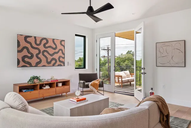 a room with a cabinets and window