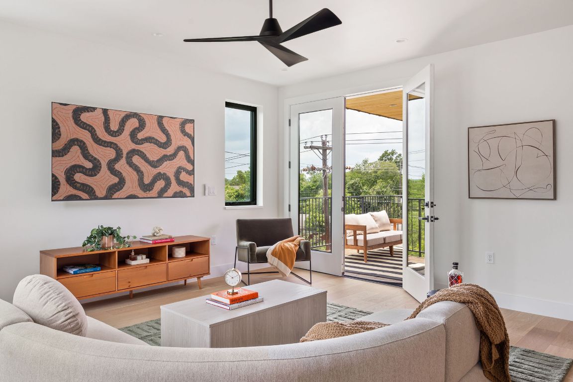 505 Philco Drive, Unit 3 Austin, TX 78745 - Photo 29 of 36 a living room with furniture and a window