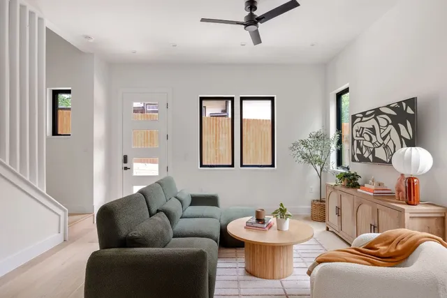 a living room with furniture and window