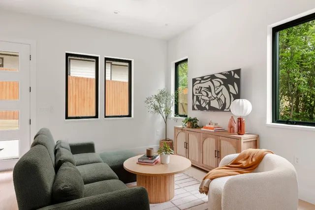 a living room with furniture and window
