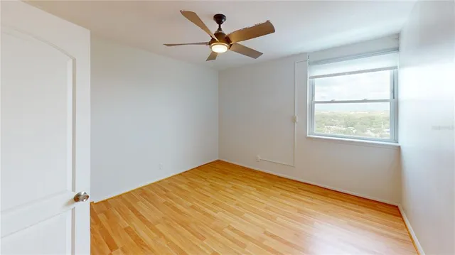 a view of a room with a large window