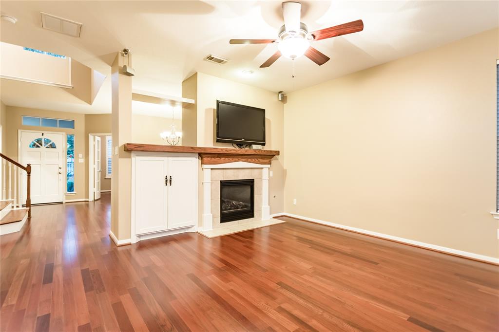 Living/family room with beautiful hardwood flooring.