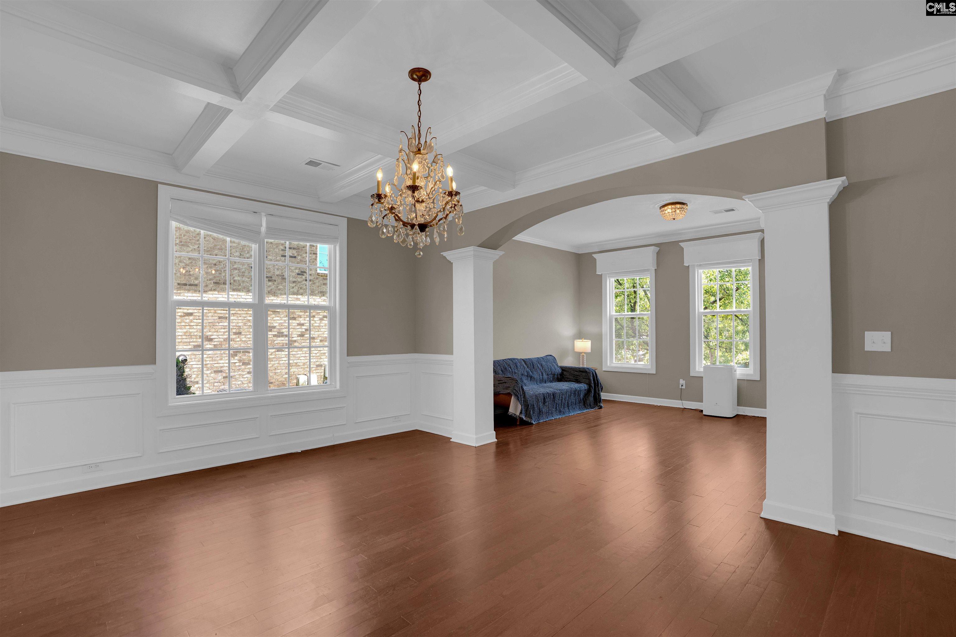 321 Asa Rose Lexington, SC 29072 - Photo 8 of 52 a view of an empty room with wooden floor and a window