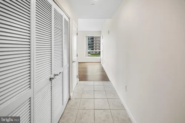 a view of a hallway with a white walls