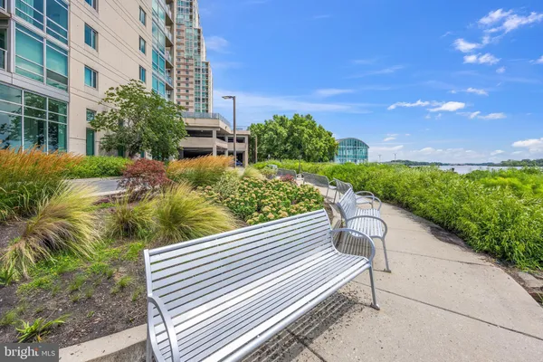 a view of a bench in front of building