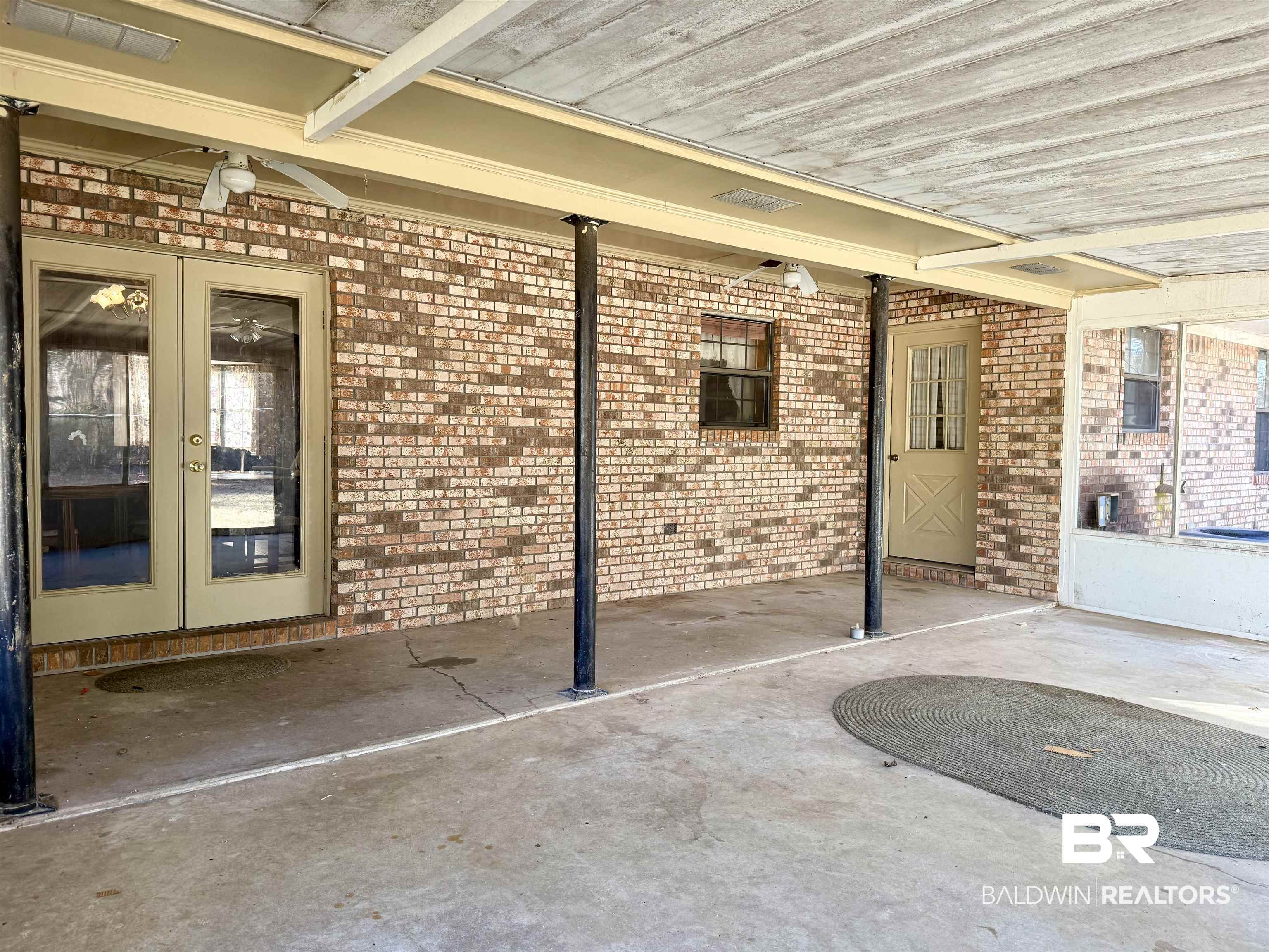 98 Evans Avenue Brewton, AL 36426 - Photo 15 of 18 View of patio featuring french doors