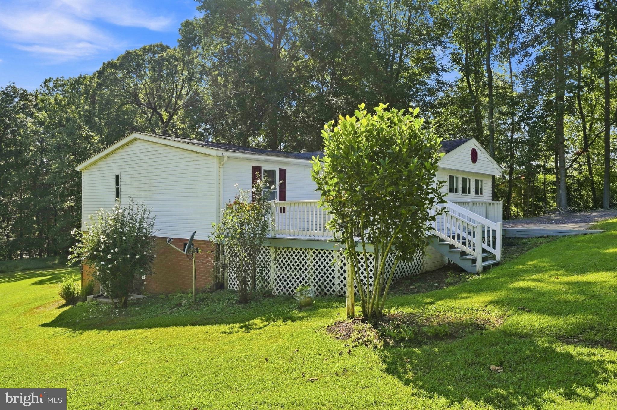 14105 Reva Road Boston, VA 22713 - Photo 3 of 38 Charming home nestled in lush greenery.