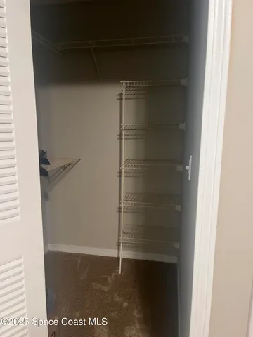 a bathroom with a glass door