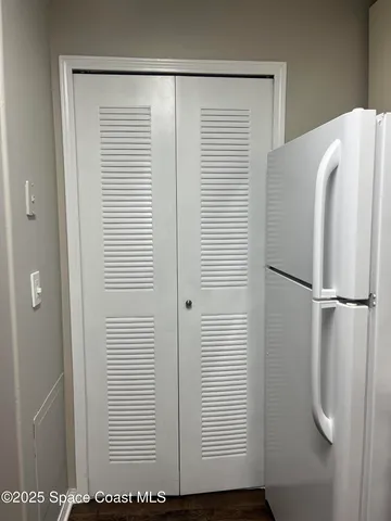 a view of a room that has a window in it