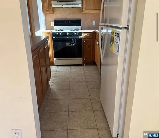a utility room with washer and dryer