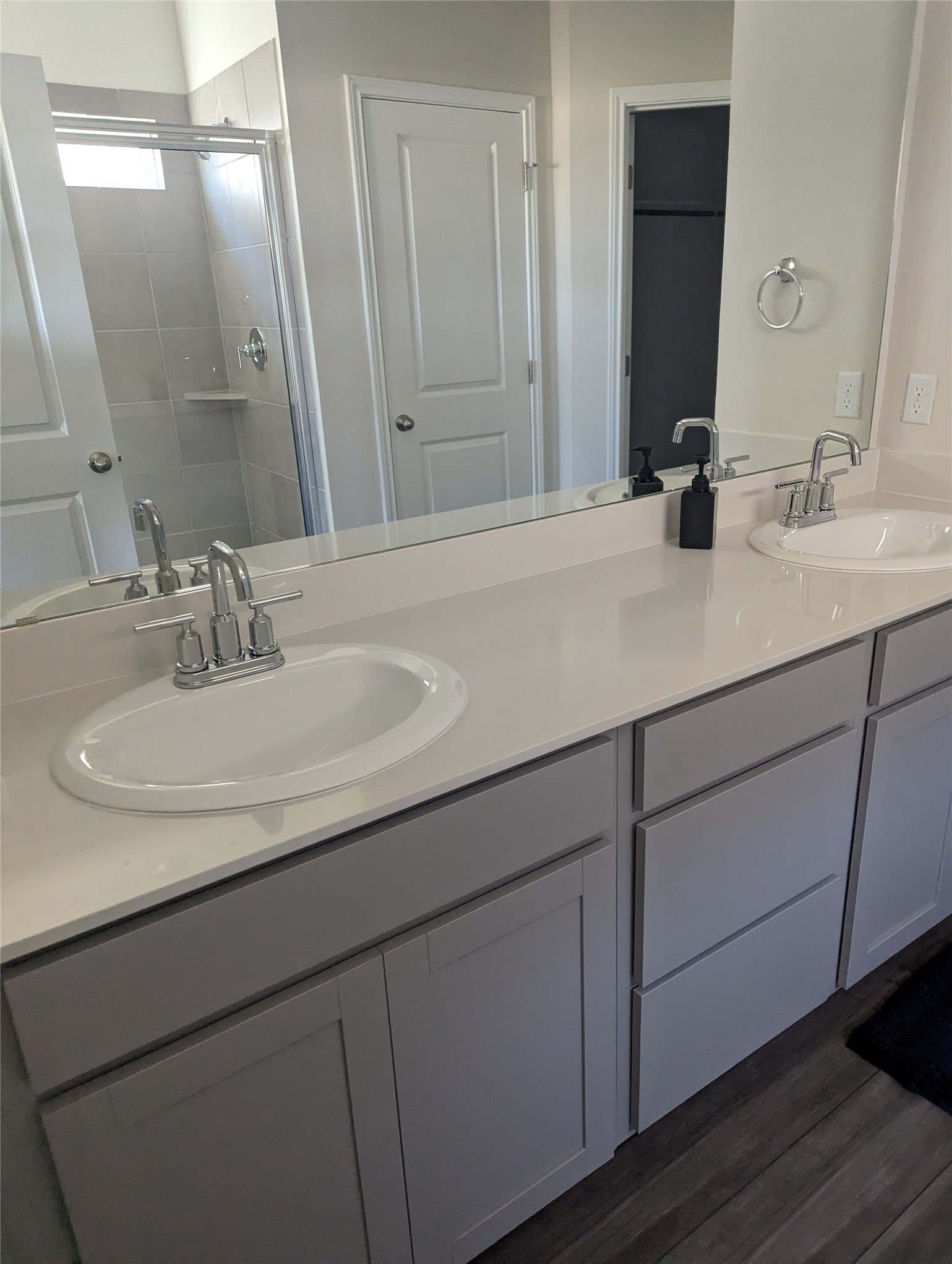 6400 Rounded Pebble Lane Buda, TX 78610 - Photo 20 of 34 a bathroom with a sink and a mirror
