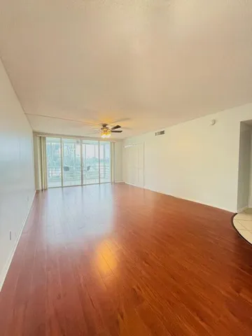 a room with window and furniture