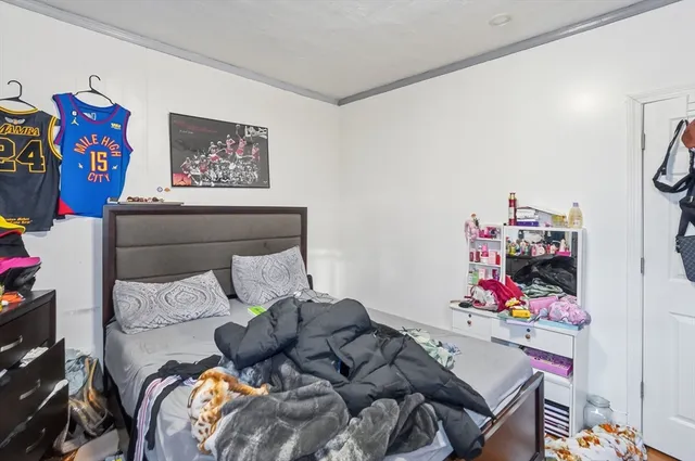 a bed room with a bed and a couch