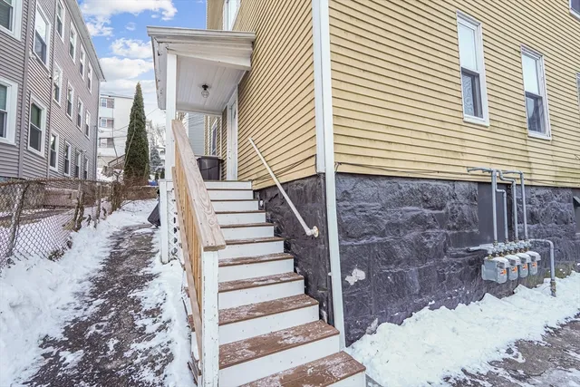 a view of a patio with two couches and deck