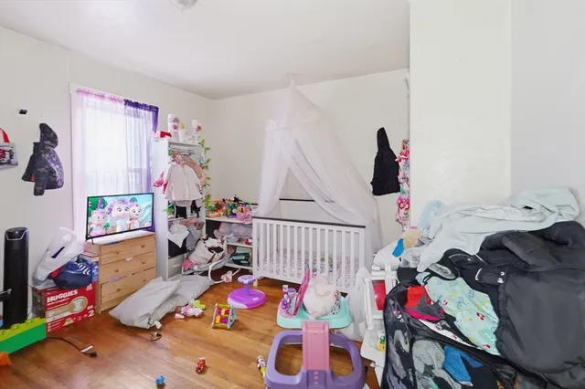 a bedroom with furniture and a couch