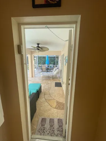 a bathroom with a shower and a sink