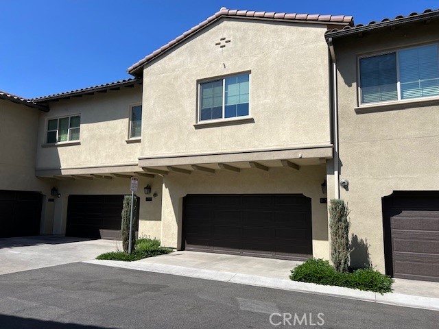 131 Lantana Drive Stanton, CA 90680 - Photo 19 of 30 a front view of a house with a garage