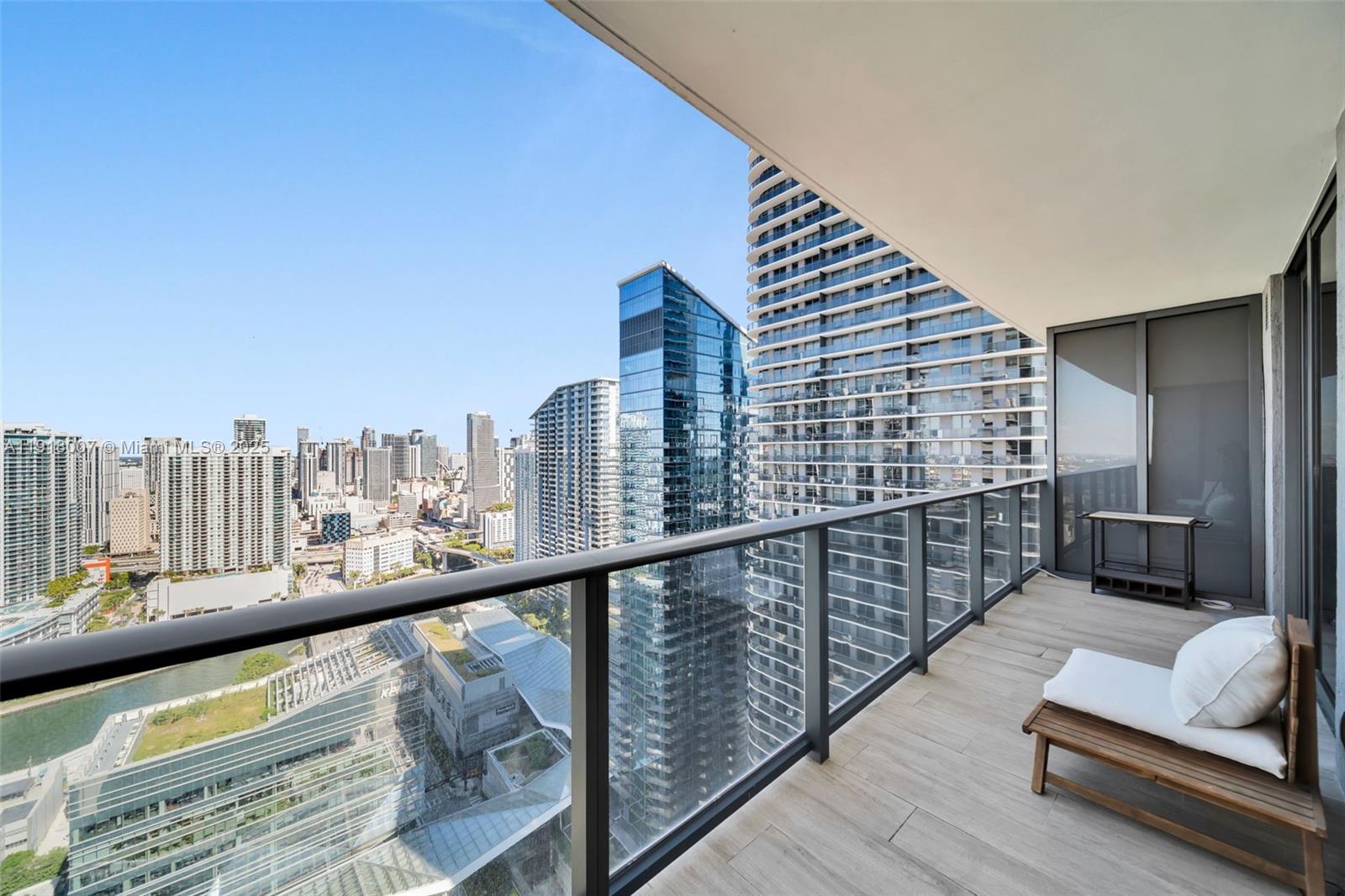 45 Southwest 9th Street, Unit 3909 Miami, FL 33130 - Photo 21 of 23 a view of balcony with furniture
