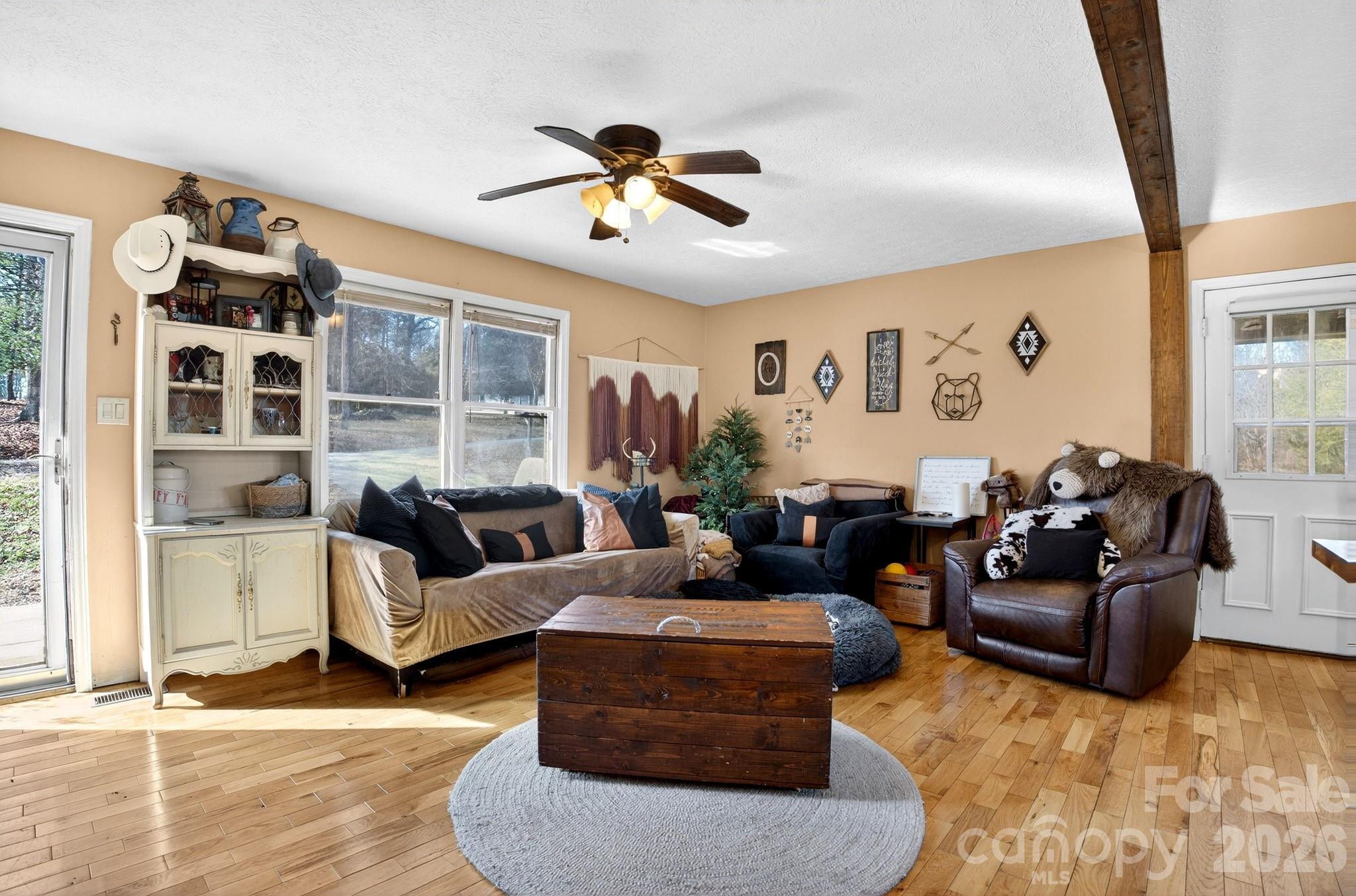 225 Baxter Street Morganton, NC 28655 - Photo 3 of 22 a living room with furniture and a large window