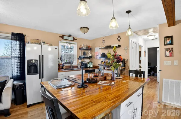 a room with granite countertop lots of counter top space