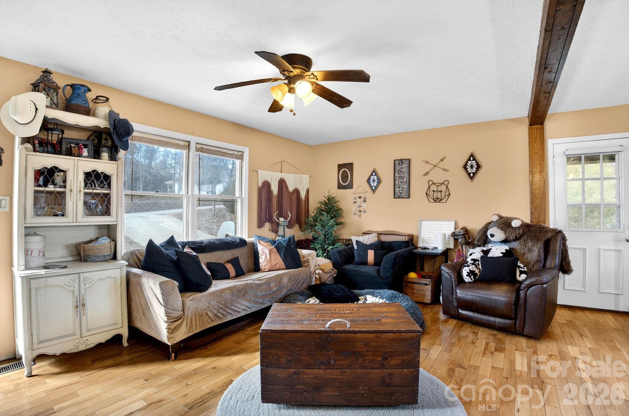225 Baxter Street Morganton, NC 28655 - Photo 7 of 22 a living room with furniture and a large window
