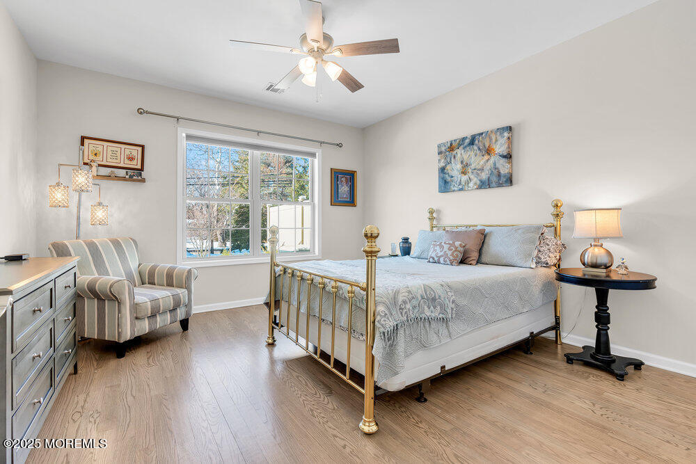 17 Green Tree Circle Hazlet, NJ 07730 - Photo 13 of 29 a spacious bedroom with a bed and a couch