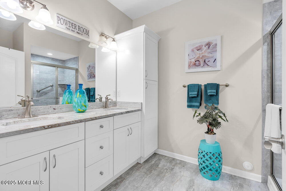 17 Green Tree Circle Hazlet, NJ 07730 - Photo 15 of 29 a bathroom with a sink and a mirror