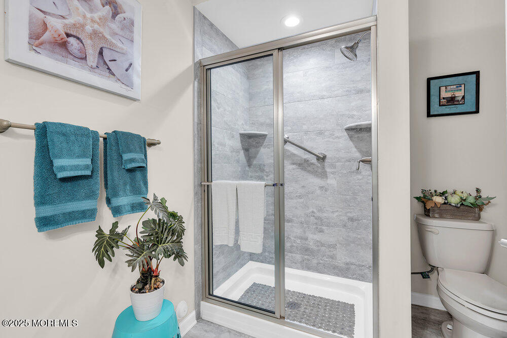 17 Green Tree Circle Hazlet, NJ 07730 - Photo 16 of 29 a bathroom with a shower a toilet and a shower