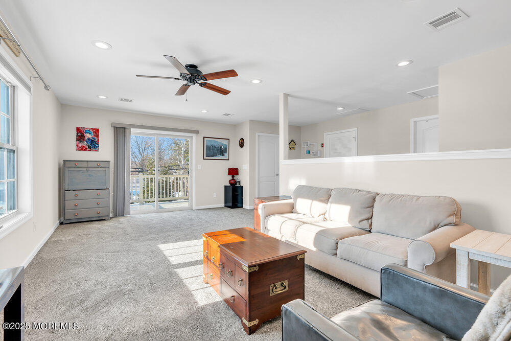17 Green Tree Circle Hazlet, NJ 07730 - Photo 21 of 29 a living room with furniture and a window