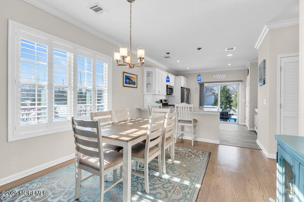 17 Green Tree Circle Hazlet, NJ 07730 - Photo 7 of 29 a view of a dining room with furniture window and outside view