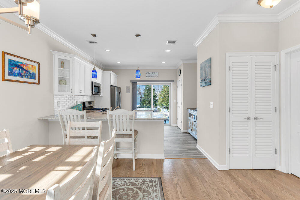 17 Green Tree Circle Hazlet, NJ 07730 - Photo 8 of 29 a view of kitchen with wooden floor and electronic appliances
