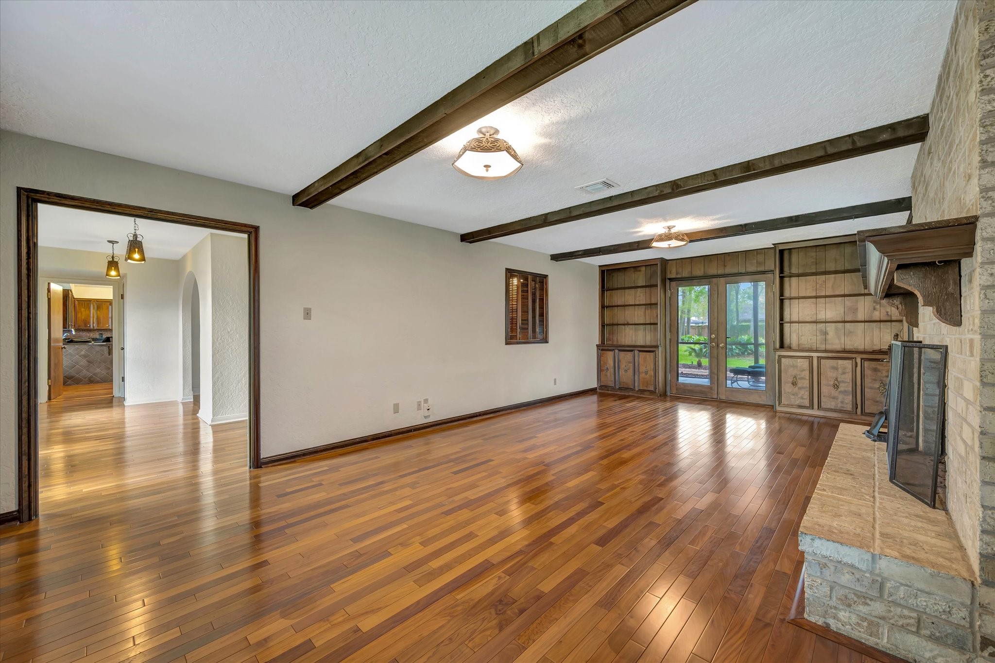 822 Devonport Lane Seabrook, TX 77586 - Photo 18 of 50 a view of a hallway with wooden floor
